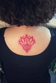 krullerige skoonheid terug lotus tattoo foto