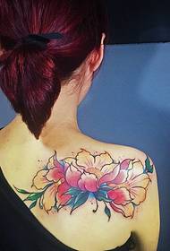 reticolo del tatuaggio fiore indietro fiorito