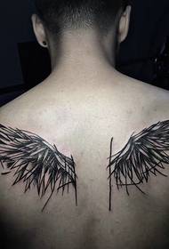 very handsome back feathers on both sides of the tattoo