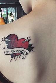 the stabbed love of the Tut tattoo looks heartbreaking