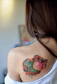 back shoulder beautiful stitching heart tattoo