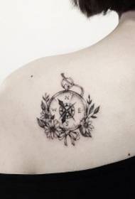 back compass with chrysanthemum tattoo pattern