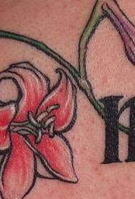 female tattoo design: beauty back text floral tattoo fine