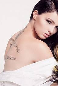 modello di tatuaggio sexy bellezza schiena musica foglio