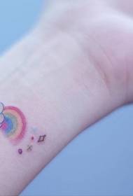 small fresh rainbow tattoo pattern on the wrist