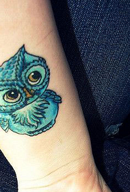 cute owl tattoo on მაჯის
