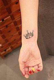 female wrist compact crown tattoo pattern