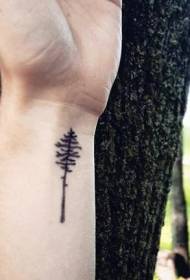 tiny black tree tattoo pattern on the wrist