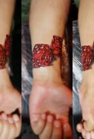modello surreale del tatuaggio del polso dei dadi rossi