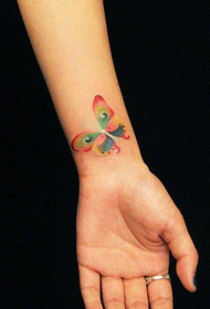 'n kleurryke vlinder tatoeëringpatroon met 'n fyn pols 96777 - oogtatoeëring in die polsneiging