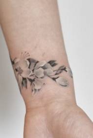 elegante motivo tatuaggio polso fiore di ciliegio bianco e grigio