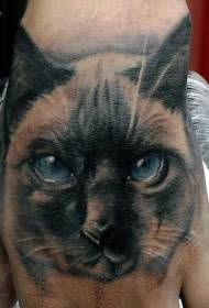 simpatico tatuaggio realistico con gatto sul dorso della mano