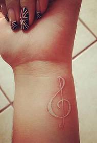 wrist white note tattoo pattern