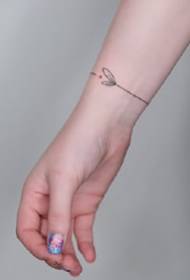 Ihe osise 9 dị mfe nke ejiri aka wristband tattoo na nkwojiaka