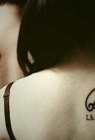 coppia tatuaggio ali totem