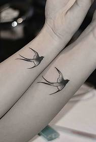 Wrist Swallows couple tattoo pattern is very interesting