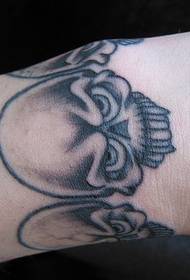 wrist Black and white skull tattoo pattern