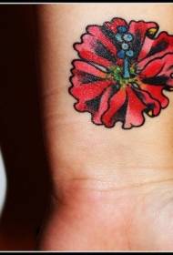 modello di tatuaggio fiore colore polso femminile