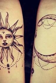 tatuagem braço alternativo com o sol e a lua