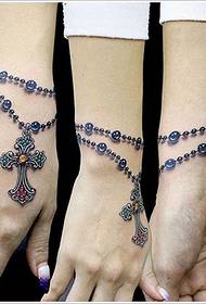 modello tatuaggio braccialetto croce