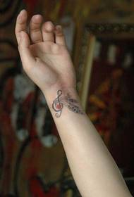 aesthetic music symbol wrist tattoo