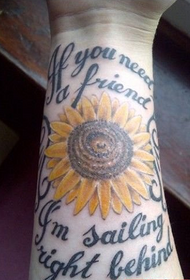 bunga matahari di lengan tato alfabet Inggris
