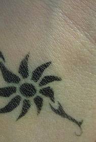 wrist tribe sun tattoo slika