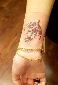 tatuaggio piccolo ombrello fresco e adorabile da polso