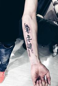 squirting English word tattoo tattoo on the wrist