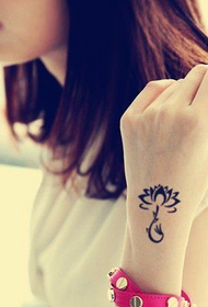 beautiful girl wrist on the lotus Totem