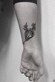 polso piccolo modello di tatuaggio fiore nero grigio fresco