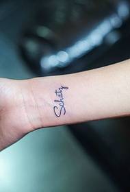 English fashion tattoo on the wrist