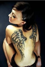 Meedchen Back dominéiert Tattoo Foto Bild