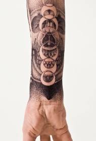 braccio tatuaggio punto nero riccio e motivo tatuaggio luna