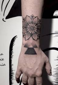 fiore di vaniglia bianco e nero dipinto a mano da polso con motivo geometrico del tatuaggio