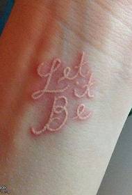 foto di tatuaggio di lettera invisibile da polso bianca fornita da padiglione di tatuaggi