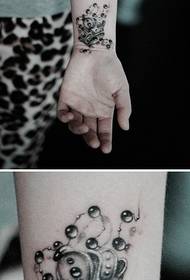 girl wrist crown and chain tattoo pattern