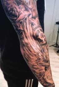 arm fun swartgrys meganiese en vleuel tattoo patroon