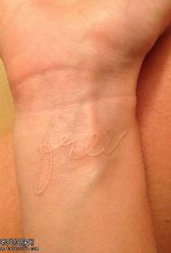 Wrist White Letter tattoo