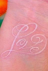 elegantna tetovaža golubskog slova na zglobu