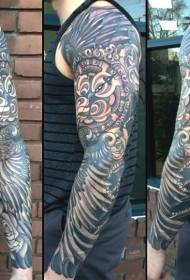 arm enorm svartgrå klocka med vingar tatuering mönster