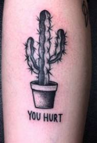 Ang nati nga baye sa tattoo sa Europa nga babaye sa English ug cactus tattoo nga litrato