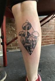 stinco maschile tatuaggio pianta su romboide e fungo tatuaggio immagine