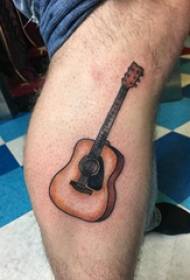 電吉他紋身男小腿上彩色吉他紋身圖片