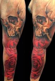 arm color combination red rose with human skull tattoo pattern