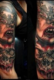 tatuagem de máscara e caveira de mulher de vampiro na cor do braço