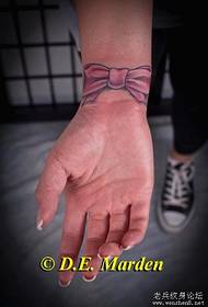 Tattoo inoratidza mufananidzo: wrist bow tattoo tattoo
