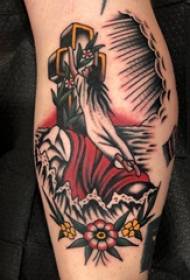Croix de tatouage figure fille veau sur la plante et croix photo de tatouage