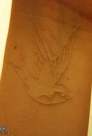 Female Wrist White Invisible Swallow Tattoo Picture