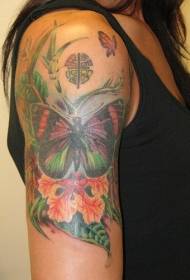 Model verde de fluturi și tatuaje florale